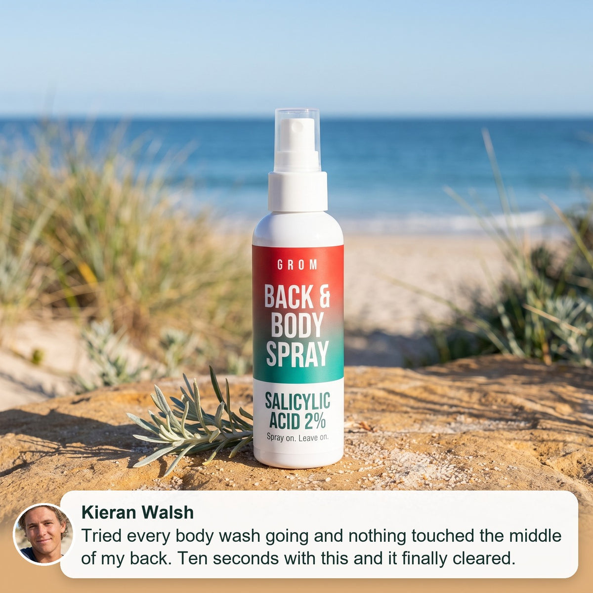 Grom back and body spray on a rock in the dunes, with a review from Kieran Walsh: tried every body wash and nothing touched the middle of my back, ten seconds with this and it finally cleared
